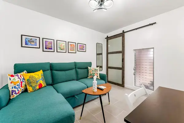 Studio room with comfortable sofa beds for evening downtime