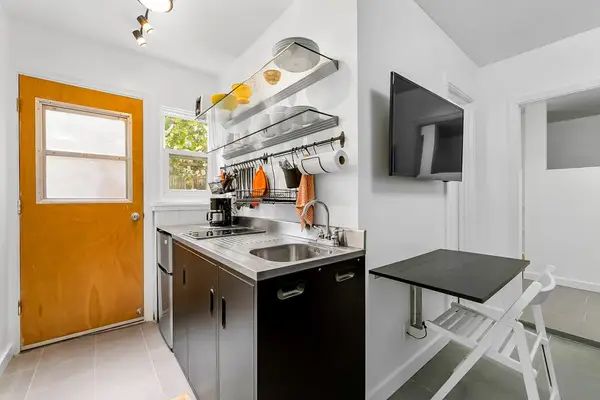 Kitchenette with essentials for preparing light meals