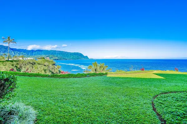 Expansive Oceanfront Lawn Overlooking Mountainous Coastline Views