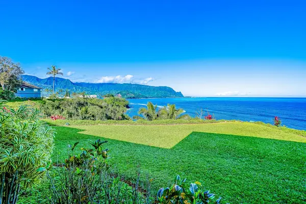 Scenic Oceanfront Lawns meeting Blue Water and Lush Mountain Scenery