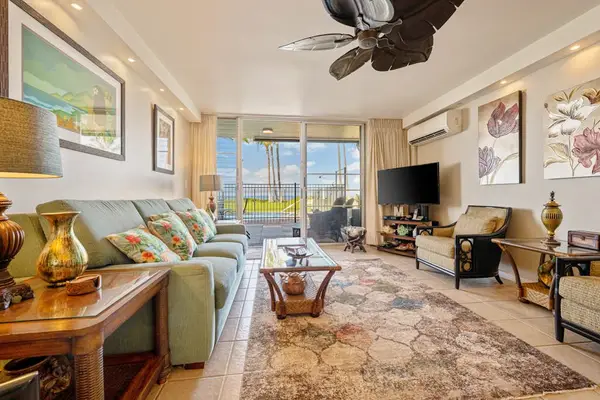 Bright Open Living With Island Charm