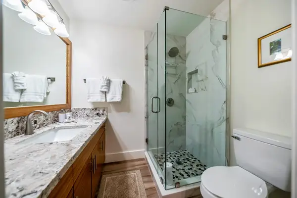 Bright bathroom vanity provides room for easy morning routines daily