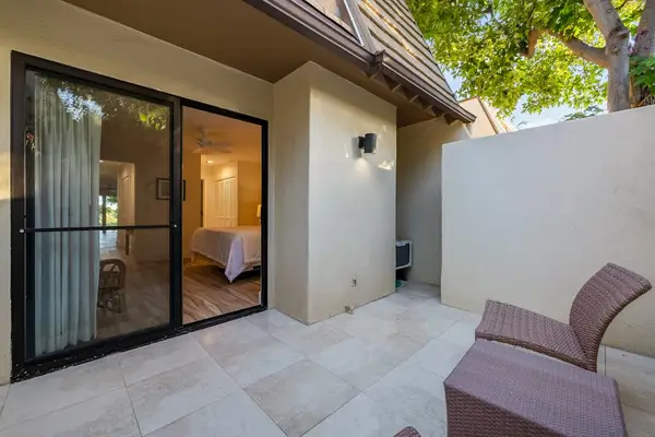 Open patio delivers fresh air and peaceful tropical views daily