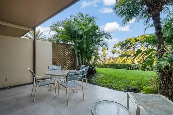Shaded patio table creates an easy setting for sunset cocktails