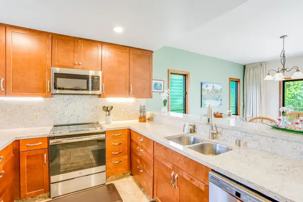 Full kitchen with modern appliances for easy cooking