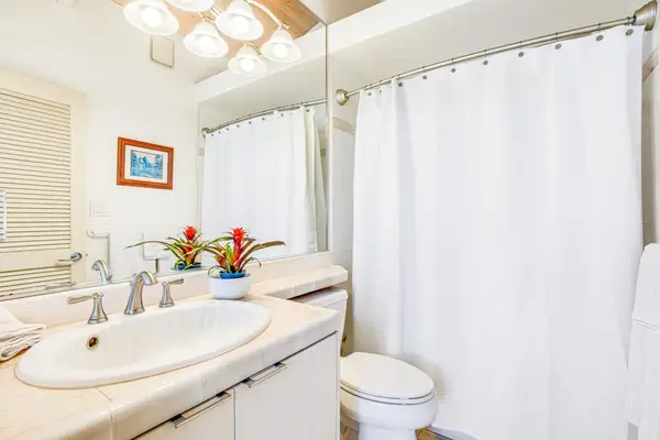 Full bathroom with walk-in shower for added convenience