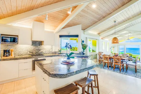 Spacious kitchen with dining access for shared meals