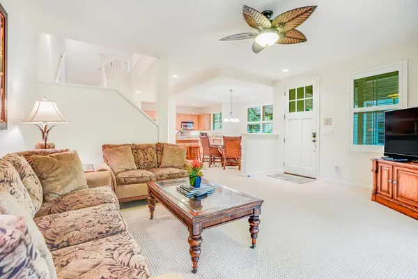 Living room with plenty of comfortable seating, flat screen tv and access to your private lanai.