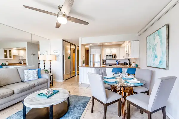 The open-concept living room offers a bright and welcoming space to relax.
