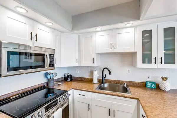 The fully equipped kitchen offers everything you need for effortless home cooking.