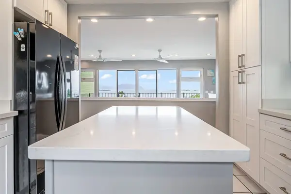 Spacious kitchen island with scenic views beyond