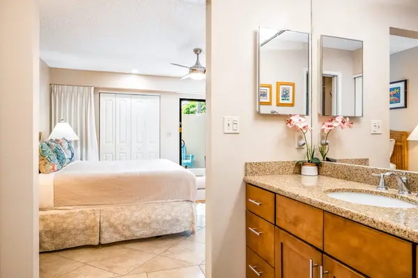 This bedroom includes king bed, full bathroom and natural light
