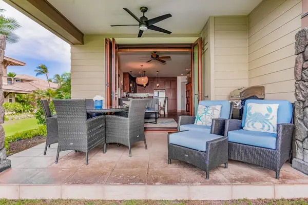 Covered Outdoor Patio Overlooking Lush Golf Course Views
