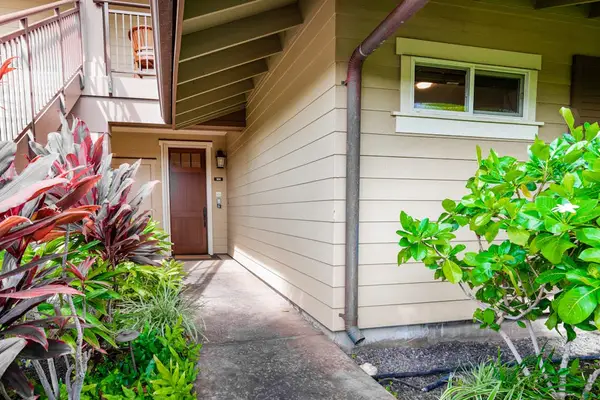 Covered Exterior Walkway Leading to Private Unit Entrance