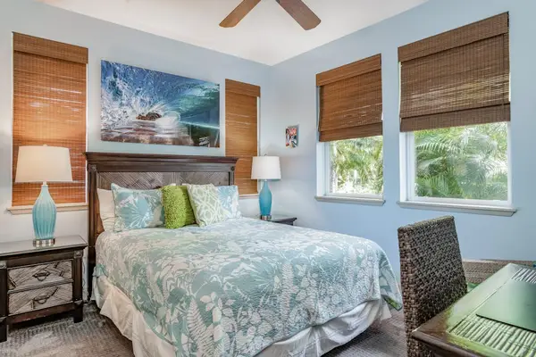 Coastal-Inspired Guest Bedroom with Queen Bed and Desk Space