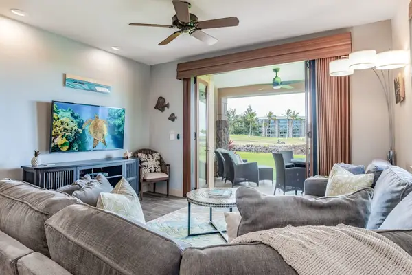 Spacious Living Area with Flat-Screen TV and Indoor-Outdoor Flow
