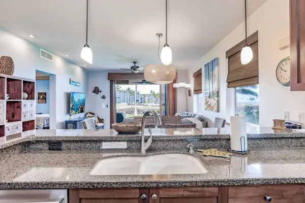 Breakfast Bar View Looking Out to the Dining and Living Areas