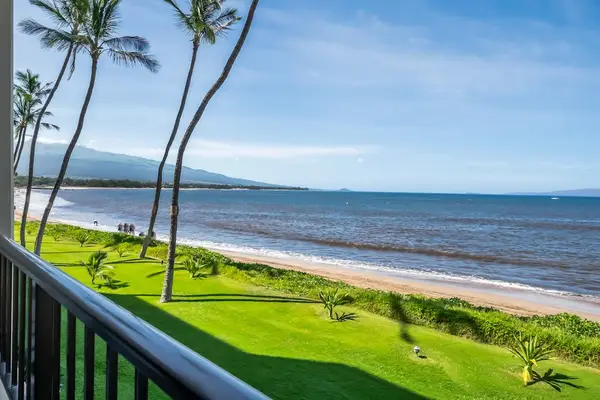 Panoramic Oceanfront Balcony Overlooking Emerald Lawns