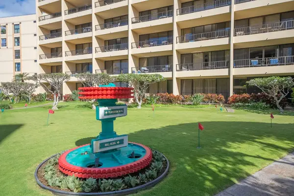 Charming Island Fountain Set In Lush Resort Grounds