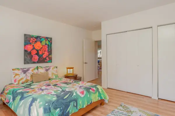 Spacious Guest Bedroom with Ample Closet Storage