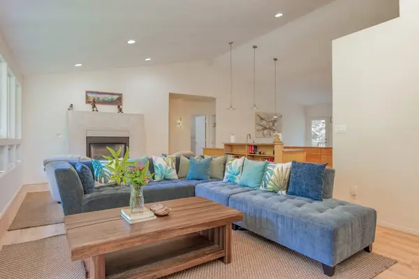 Spacious Open-Concept Living Room & Fireplace