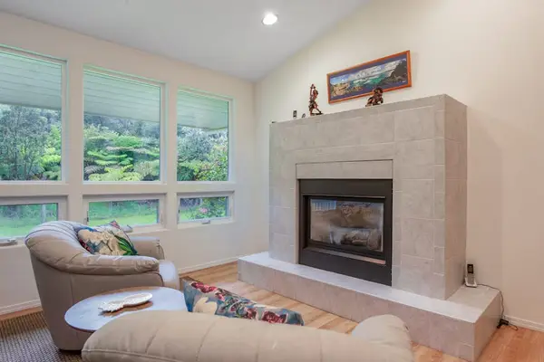 Cozy Fireplace Nook with Forest Views