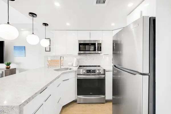 Enjoy a beautifully lit kitchen designed for slow breakfasts and shared dinners.
