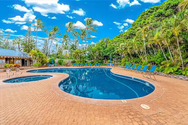 Resort pool offers refreshing swims surrounded by tropical island scenery