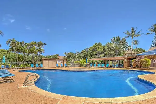 Tropical resort scenery showcases pool views and peaceful surroundings