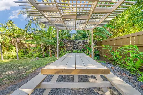 Shared outdoor dining area perfect for enjoying meals in the fresh island air