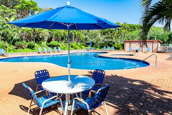 Spend carefree vacation days enjoying the sparkling shared pool and tropical surroundings