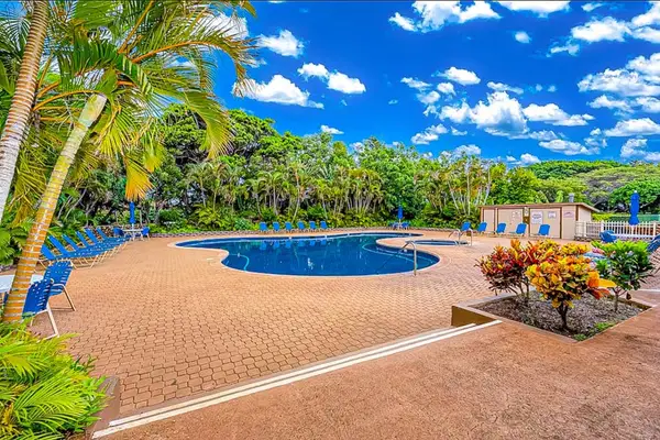 Resort pool provides a refreshing escape after exploring nearby beaches and attractions