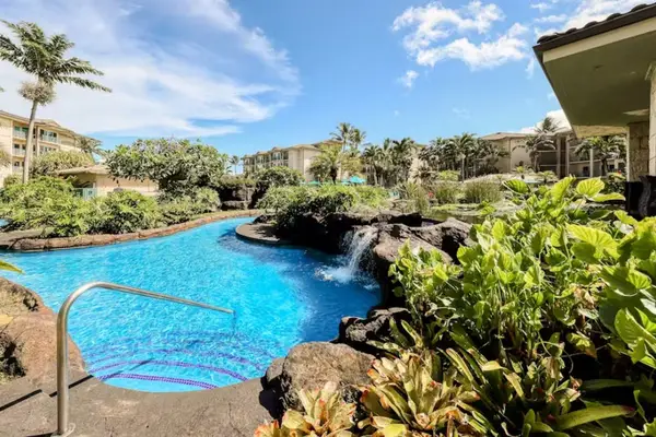Tropical Resort Pool with Rock Waterfall Feature