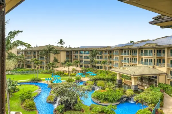 Courtyard Balcony View of Winding Lazy River Pool & Resort Grounds