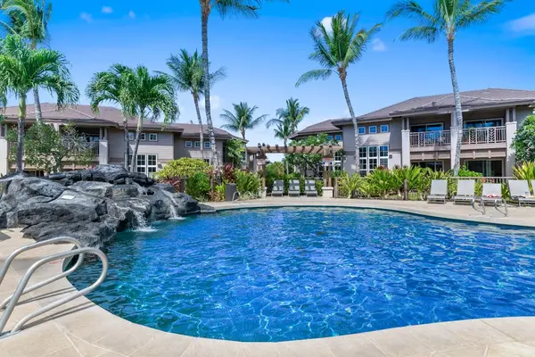Resort Lagoon Pool with Waterfall Feature & Lounge Chairs