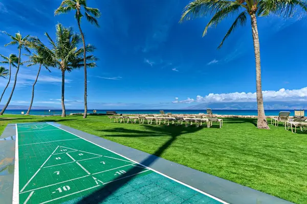 Have fun with a friendly game of shuffleboard under the Hawaiian sunshine.