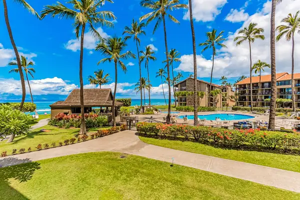Enjoy sweeping views of the tropical grounds, pool, and Pacific Ocean.