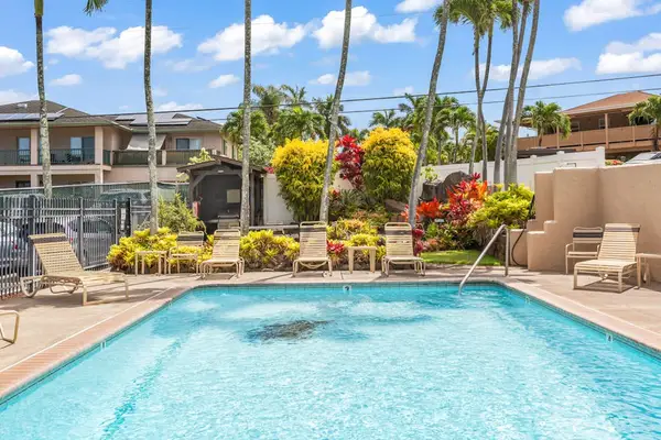 Refreshing resort pool under sunny skies