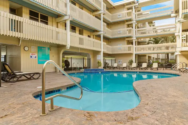 Resort pool surrounded by the property, great for a refreshing swim.