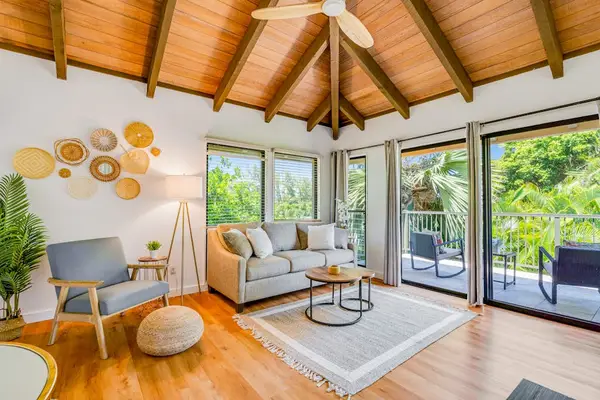Vaulted Living Room With Tropical Charm
