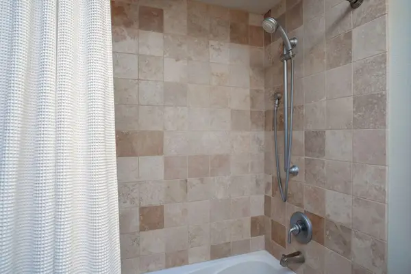 Walk-in shower with elegant tile finishes