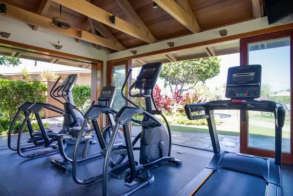 Fitness room with ocean views to keep active
