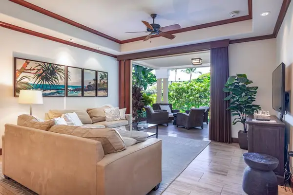 Bright living room with lanai access