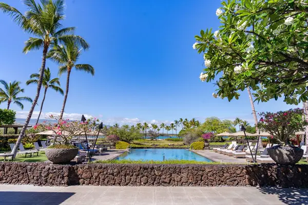 Resort-style pool with ocean views