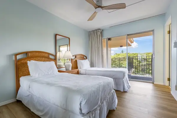 Just as much comfort for the guests - two twin beds with access to your private lanai.