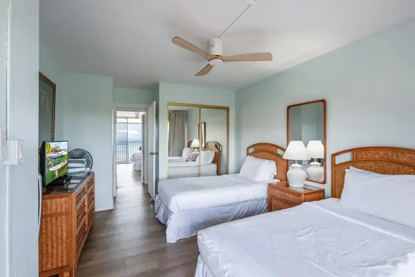 Just as much comfort for the guests - two twin beds with access to your private lanai.