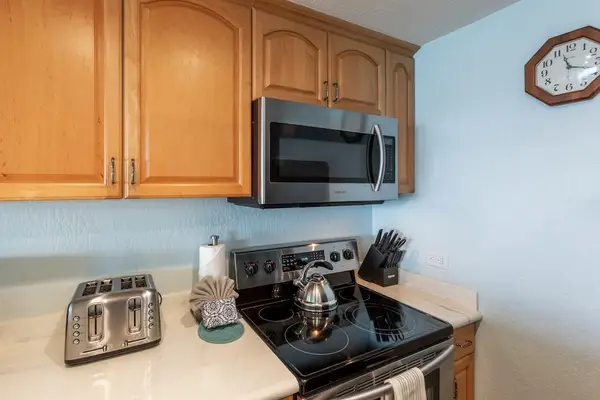 The home features several renovations including new finishes and an upgraded kitchen with stainless steel appliances and gleaming countertops - here, you'll have all you need for cooking delicious meals.