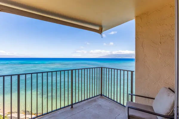 Private lanai - glorious views of the tropical waters of the Pacific Ocean.  Unwind with a glass of wine and the ocean breeze.
