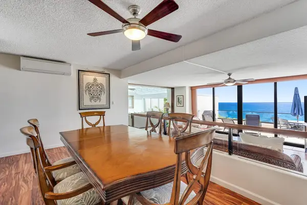 Dining room bathed in natural light, ideal for long lunches with family