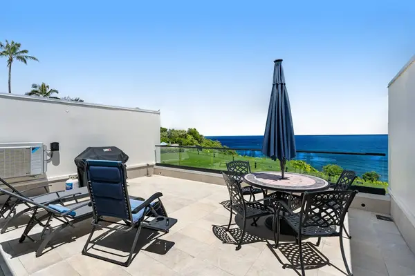 Terrace to soak up the sun with ocean views and a dining area